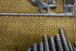 Assorted surgical screws, tools, fixators