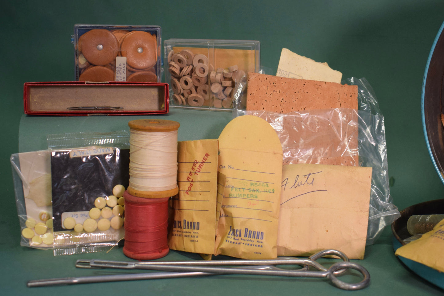 Various Woodwind Instrument Repair Implements in Vintage Tin