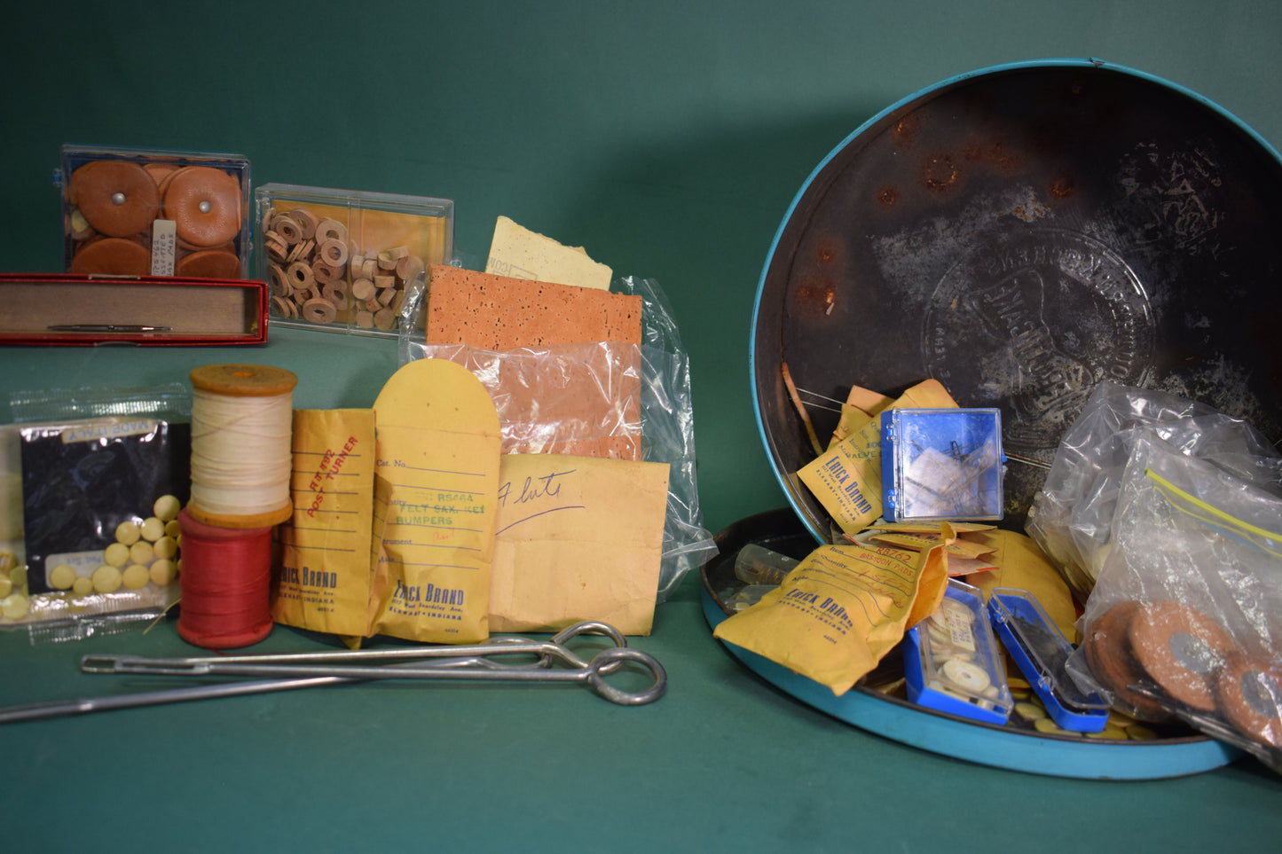 Various Woodwind Instrument Repair Implements in Vintage Tin